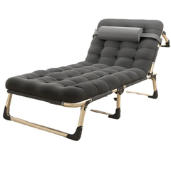 Gray folding lounge chair with armrest on a white background