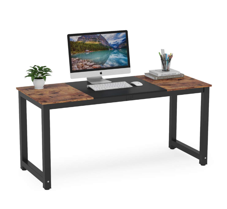 Wooden desk with computer setup on a white background