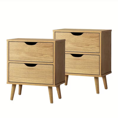 Two wooden nightstands with multiple drawers on a white background