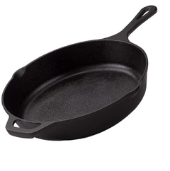 Black cast iron skillet on a white background
