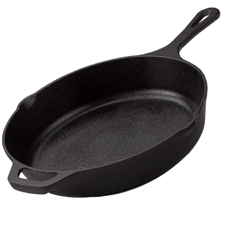 Black cast iron skillet on a white background