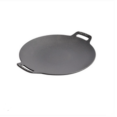 Black frying pan with handle on a white background