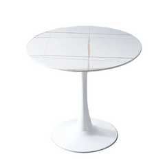 White round table in a room with light gray carpet and white curtains.